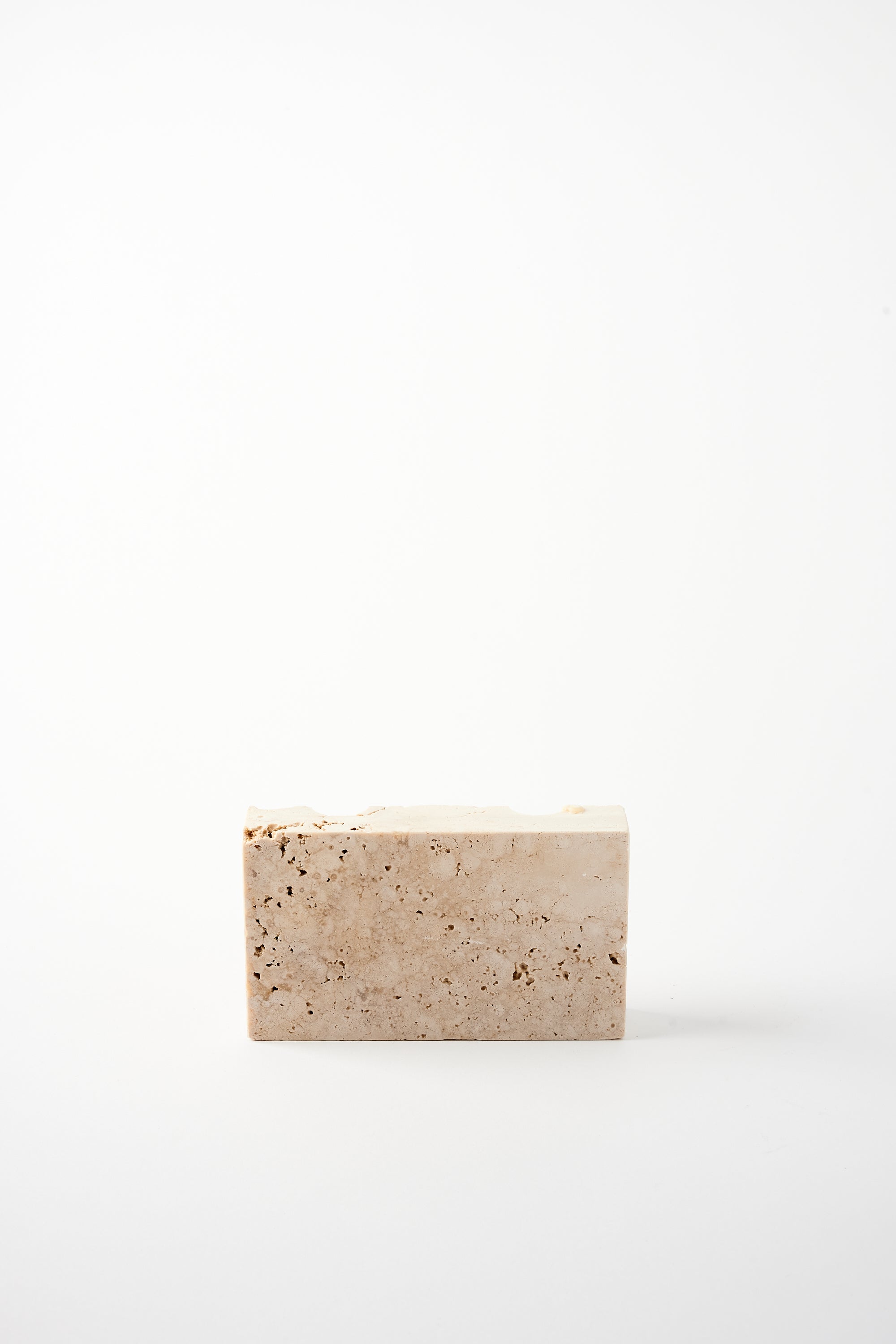 SANNA VÖLKER RAW TRAVERTINE SNUG CANDLE HOLDER